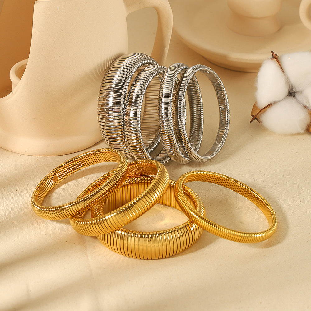 Ribbed open cuff bracelets with silver and gold finishes SL-052