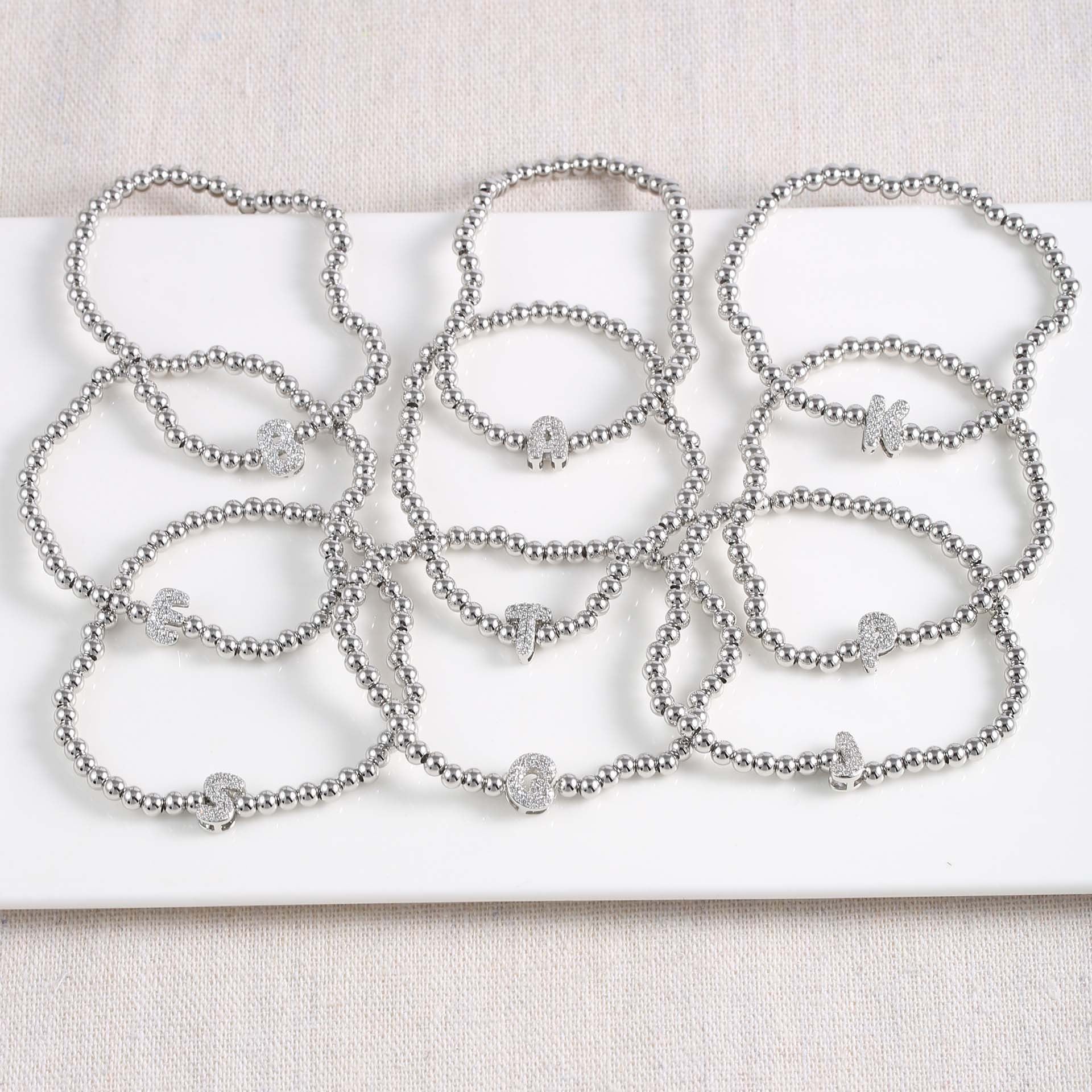 bracelet stainless steel minimalist beaded adjustable letter charm layering personalized daily wear stackable gift SL-078