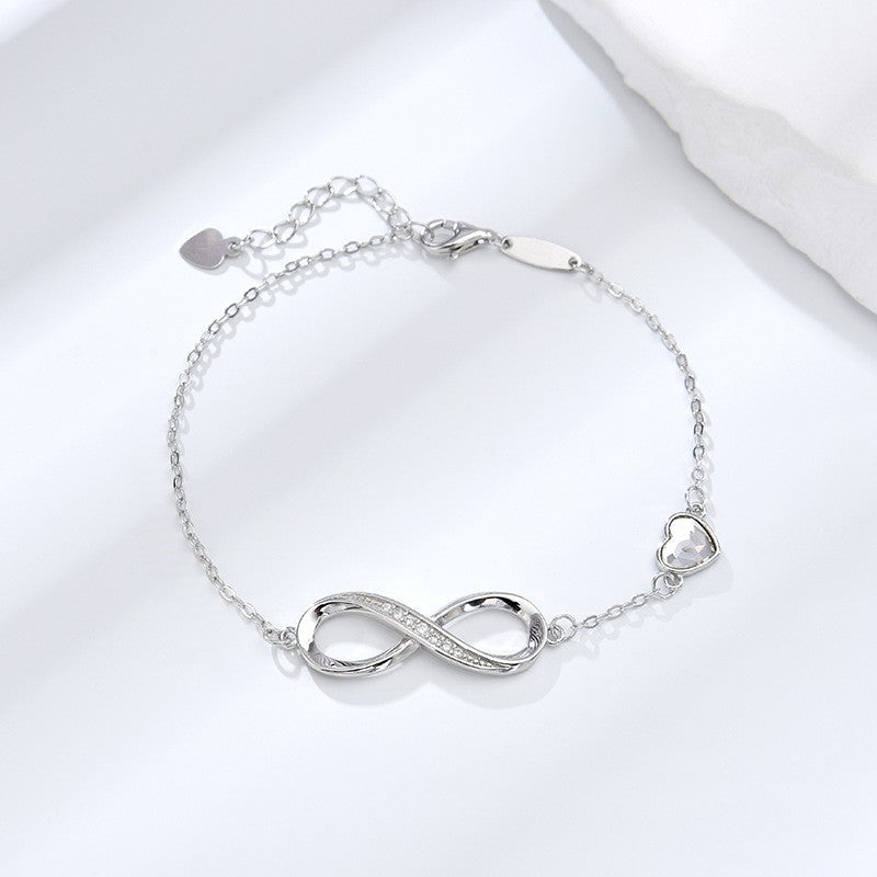Infinity bracelet, minimalist jewelry, sterling silver, crystal heart charm, dainty bracelet, everyday wear, elegant gift, romantic jewelry, adjustable chain, timeless design SL-088