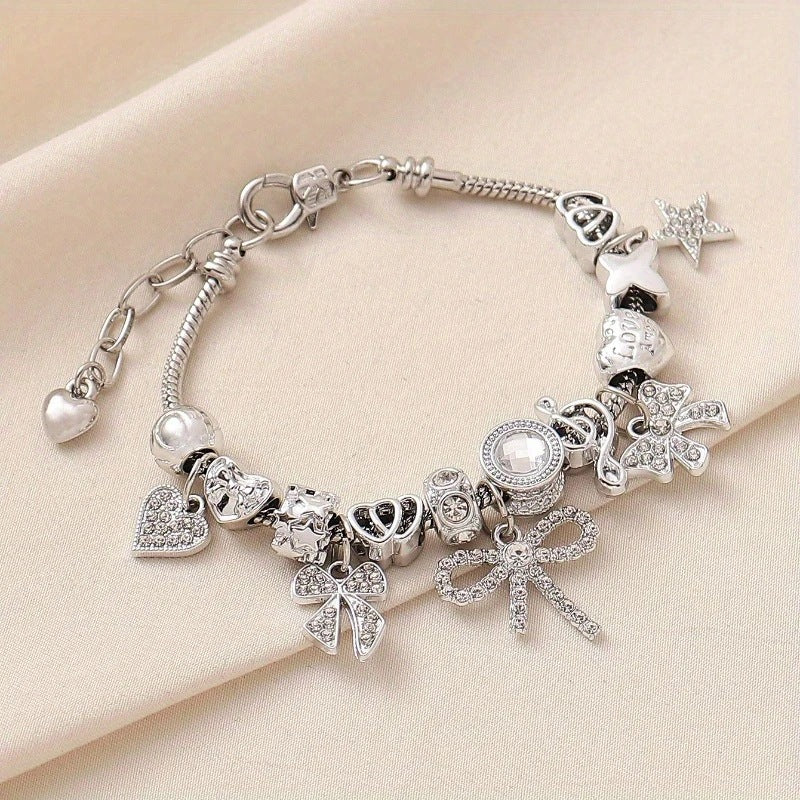 charm bracelet, bow charm bracelet, heart charm bracelet, crystal bracelet, silver snake chain bracelet, statement jewelry, adjustable bracelet, feminine jewelry, gift for her, elegant daily accessory SL-095