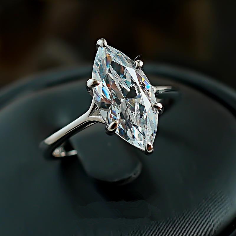 marquise cut ring, solitaire engagement ring, gold statement ring, minimalist ring, elegant crystal ring, timeless jewelry, classic engagement ring, luxury fashion ring, silver gold ring, daily wear fine jewelry JZ-113