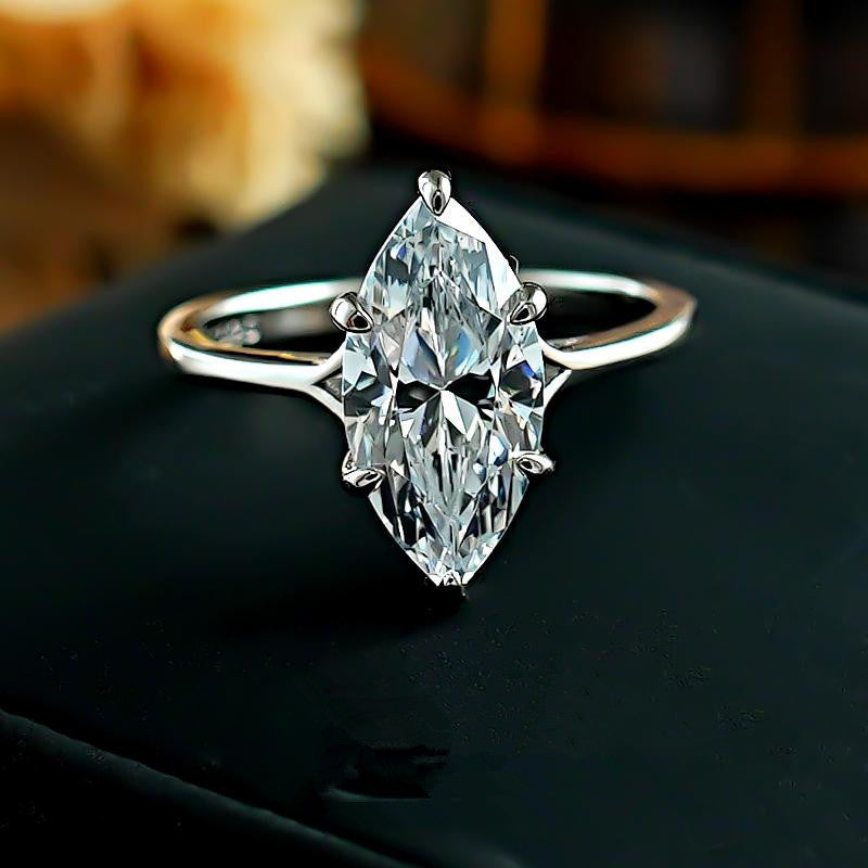 marquise cut ring, solitaire engagement ring, gold statement ring, minimalist ring, elegant crystal ring, timeless jewelry, classic engagement ring, luxury fashion ring, silver gold ring, daily wear fine jewelry JZ-113