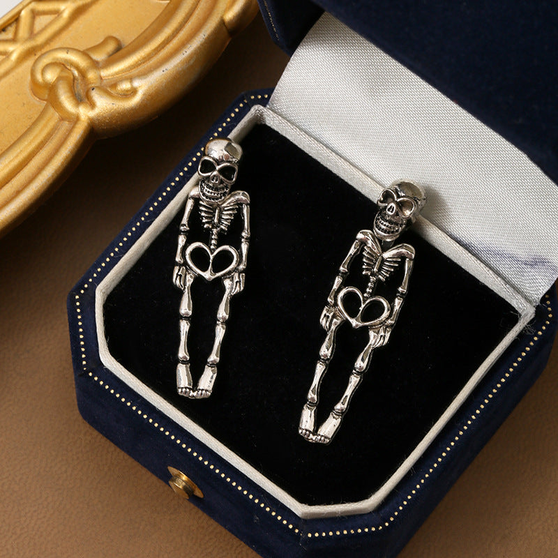 skeleton earrings, gothic jewelry, punk earrings, halloween style, silver statement earrings, edgy design, vintage skeleton studs, bold fashion, daily casual gothic, cool accessories EH-069