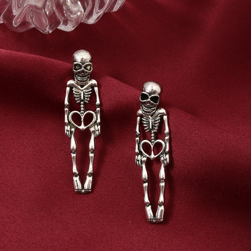 skeleton earrings, gothic jewelry, punk earrings, halloween style, silver statement earrings, edgy design, vintage skeleton studs, bold fashion, daily casual gothic, cool accessories EH-069