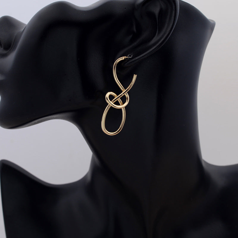abstract earrings, twisted hoop earrings, statement earrings, minimalist jewelry, stainless steel earrings, gold silver earrings, modern art style, geometric design, lightweight earrings, daily wear EH-087