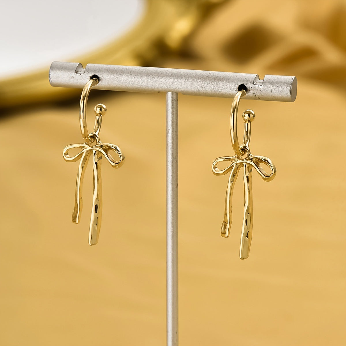 bow earrings, gold earrings, minimalist earrings, dainty jewelry, ribbon earrings, statement earrings, daily wear earrings, artistic jewelry, modern design earrings, lightweight earrings EH-096