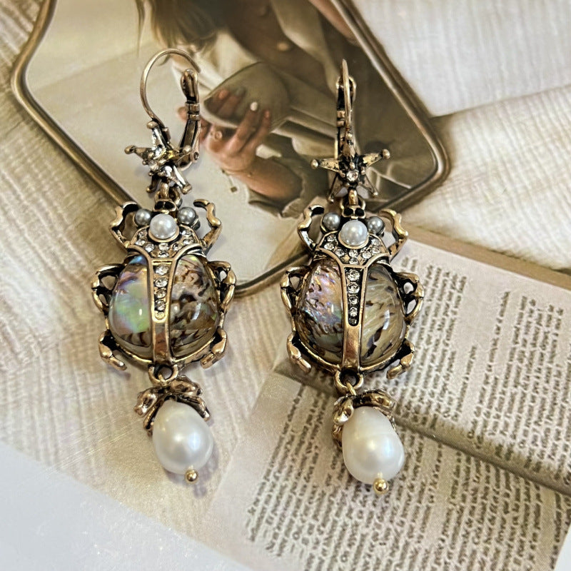 vintage beetle earrings, pearl drop earrings, statement jewelry, baroque style, abalone shell earrings, artistic earrings, bohemian luxury, retro glamour, unique insect earrings, opulent design EH-113