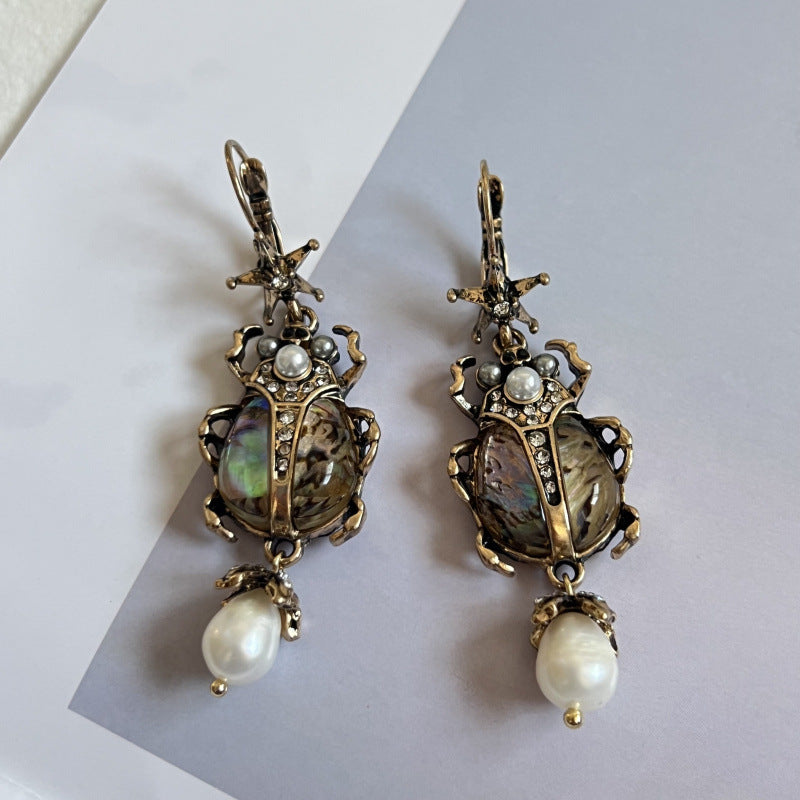 vintage beetle earrings, pearl drop earrings, statement jewelry, baroque style, abalone shell earrings, artistic earrings, bohemian luxury, retro glamour, unique insect earrings, opulent design EH-113
