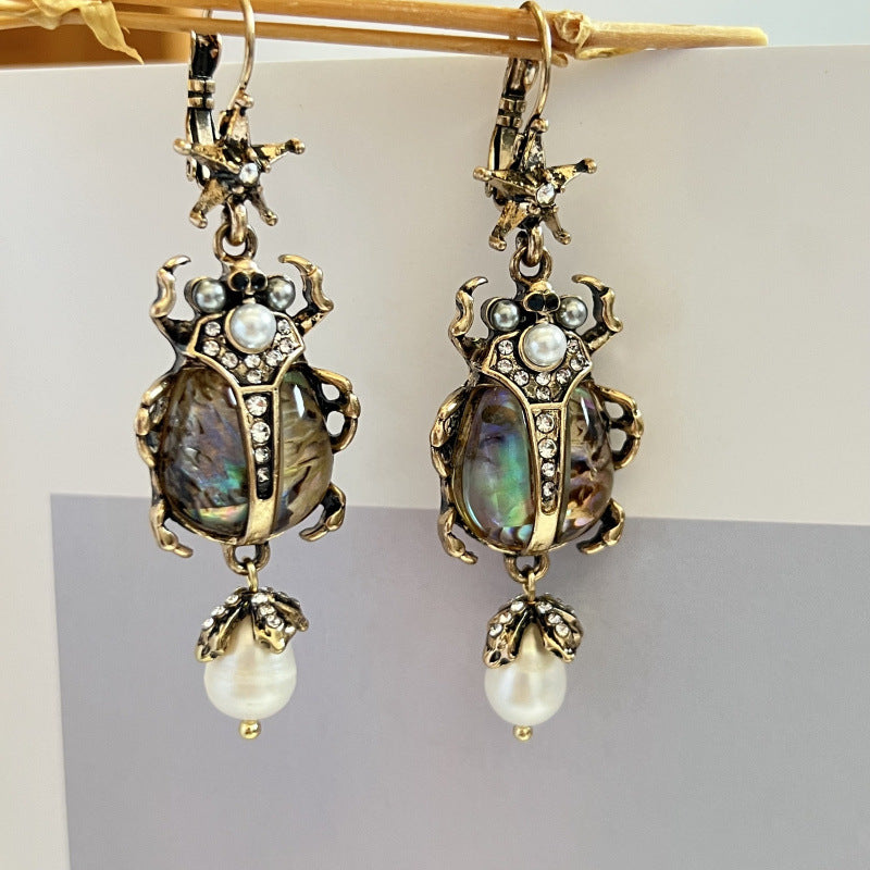 vintage beetle earrings, pearl drop earrings, statement jewelry, baroque style, abalone shell earrings, artistic earrings, bohemian luxury, retro glamour, unique insect earrings, opulent design EH-113