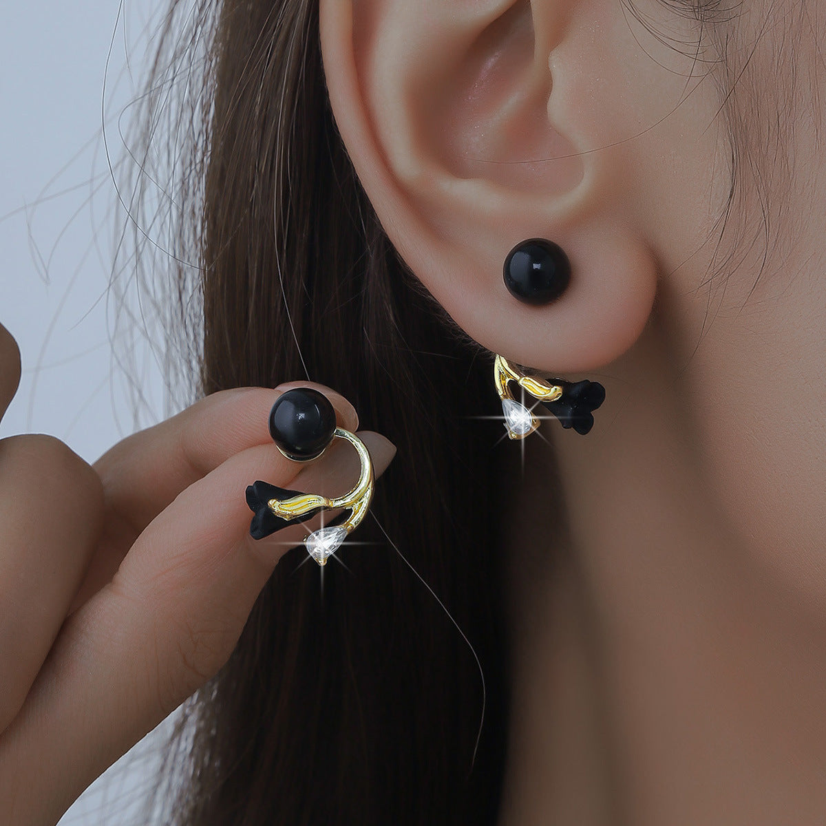 rose bud earrings, red earrings, black earrings, gold accent jewelry, romantic earrings, asymmetrical design, crystal detail, modern floral style, statement studs, date night accessories EH-118