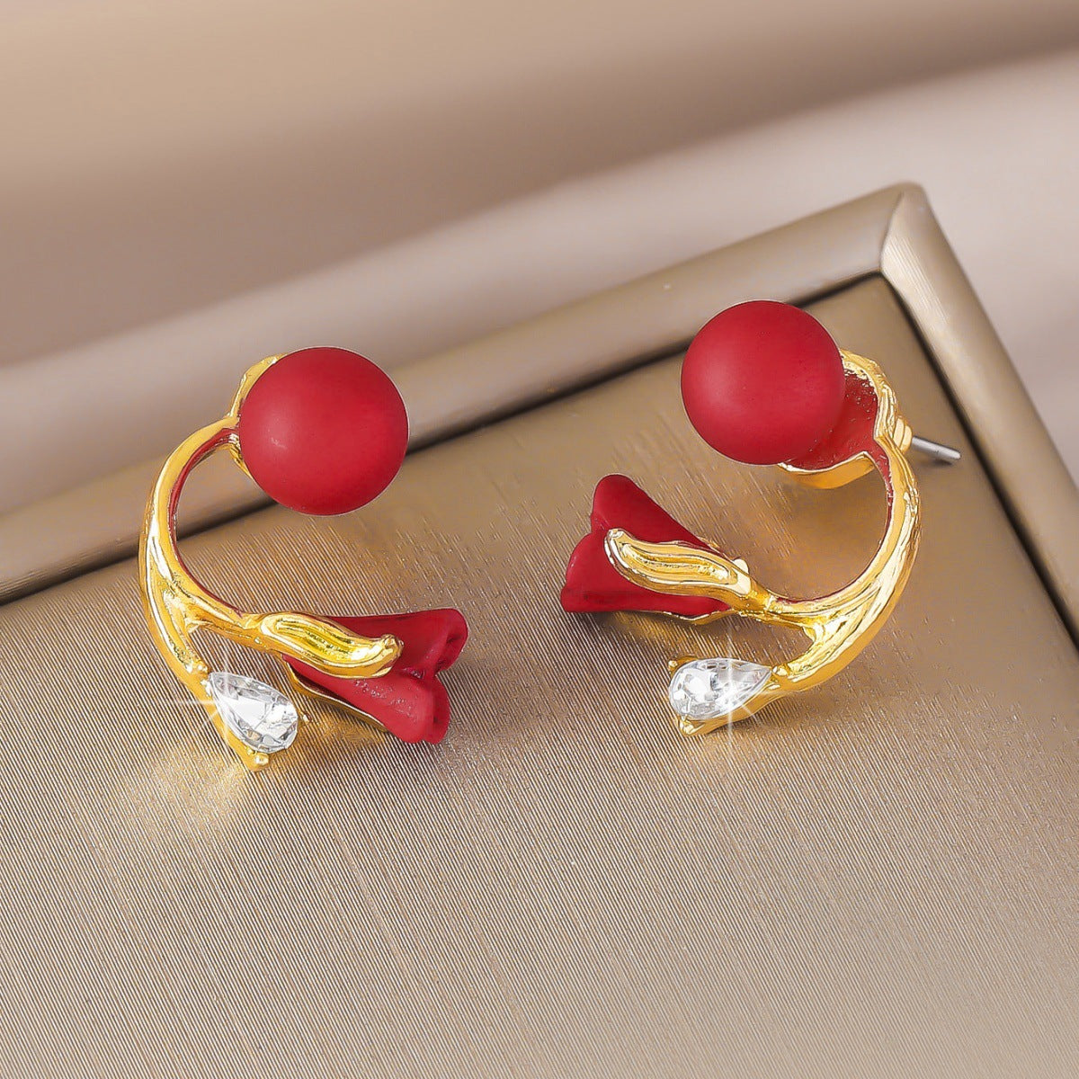 rose bud earrings, red earrings, black earrings, gold accent jewelry, romantic earrings, asymmetrical design, crystal detail, modern floral style, statement studs, date night accessories EH-118