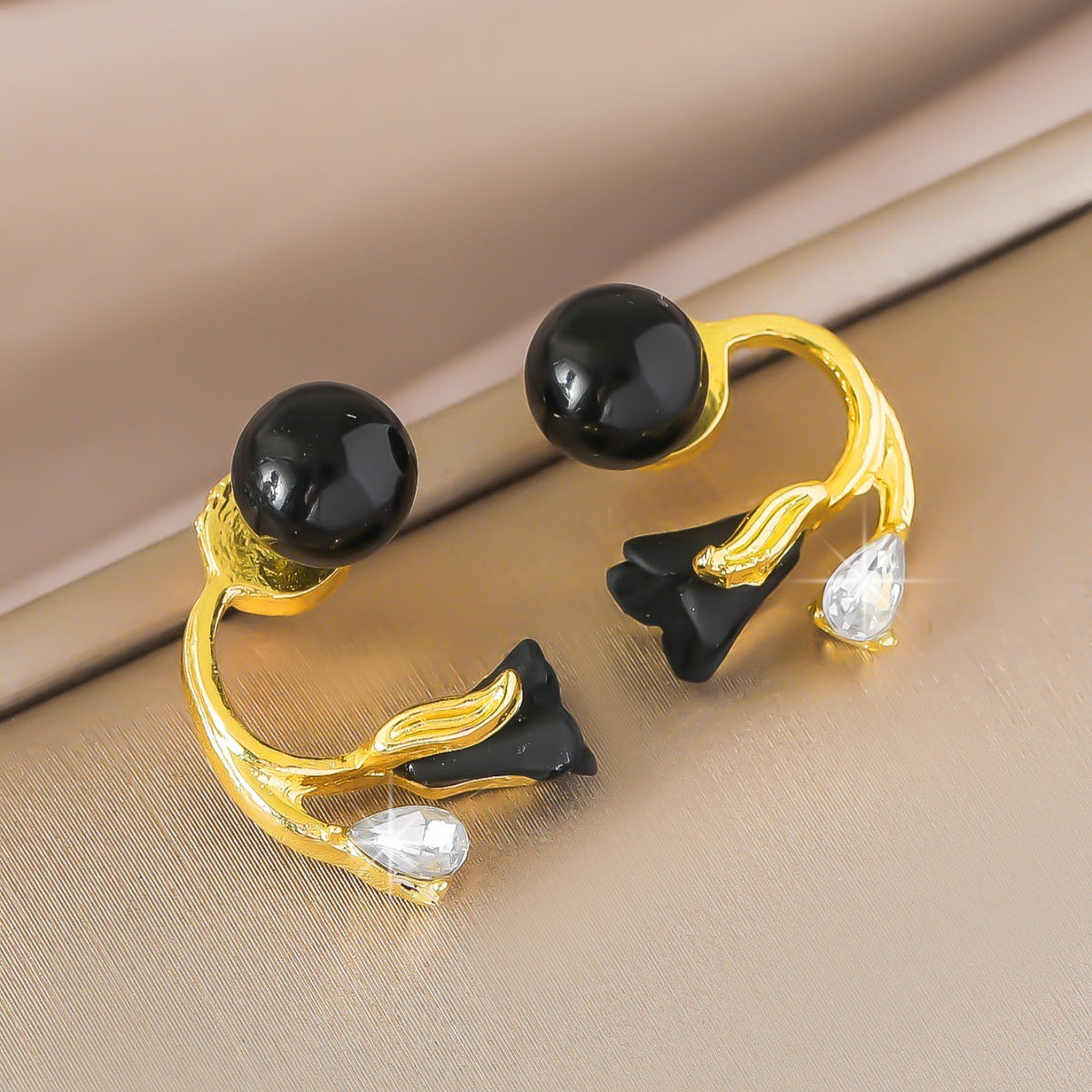 rose bud earrings, red earrings, black earrings, gold accent jewelry, romantic earrings, asymmetrical design, crystal detail, modern floral style, statement studs, date night accessories EH-118